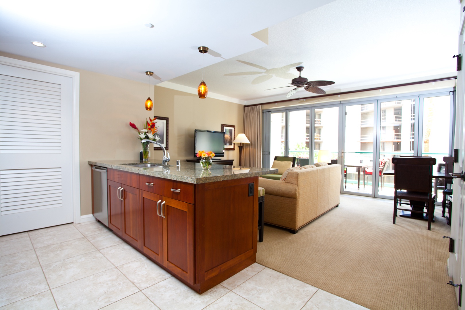 Lahaina Vacation Rentals, Honua Kai Hokulani 214 - The open-concept design seamlessly connects the kitchen and living area, creating an inviting space perfect for entertaining or relaxing with loved ones.