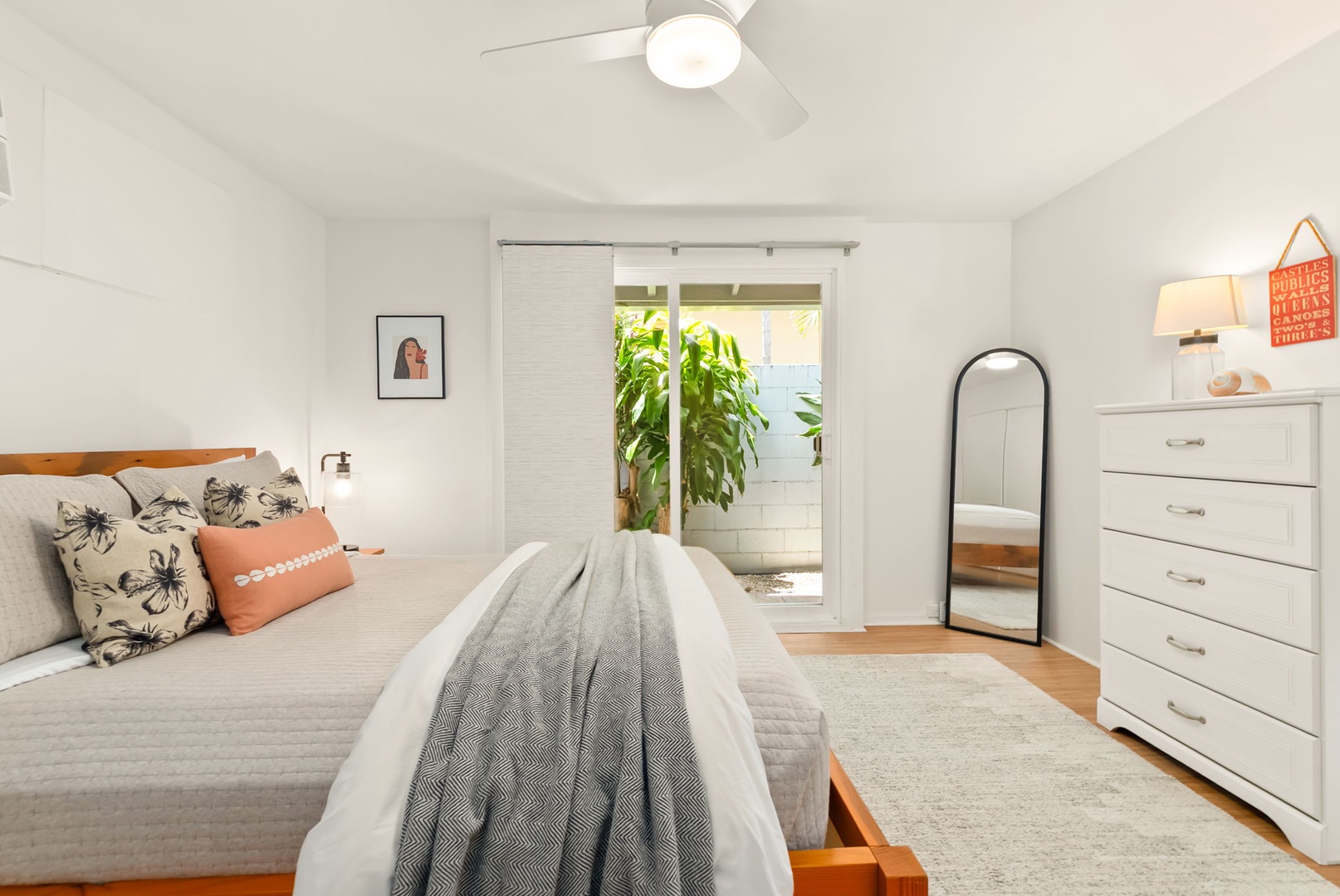 Honolulu Vacation Rentals, Ho'okipa Villa - Unwind in your peaceful bedroom retreat, where soft textures and gentle natural light create the perfect atmosphere for rest. Step through to your private outdoor escape.
