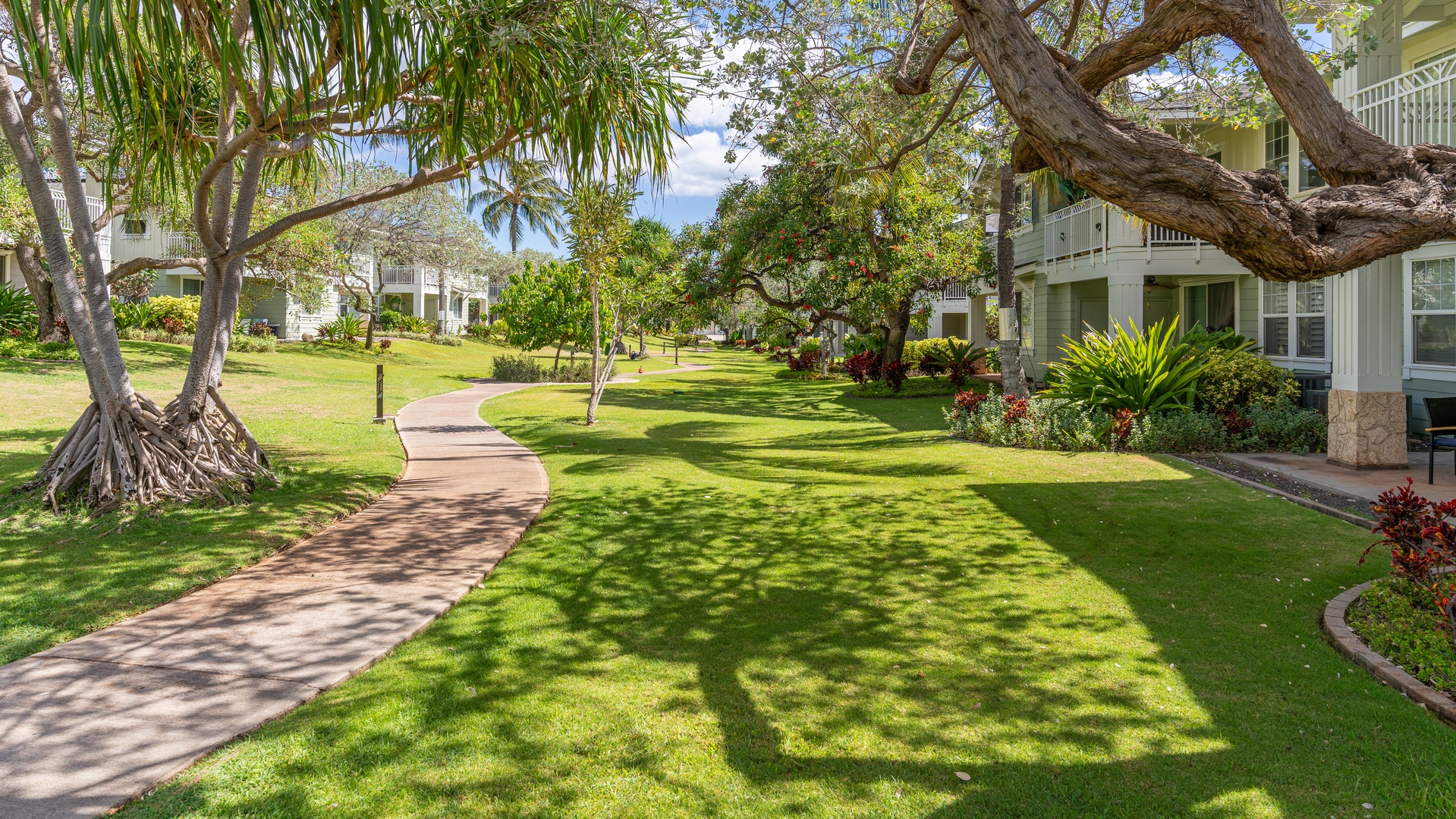 Kapolei Vacation Rentals, Ko Olina Kai 1027A - Take a stroll under sun dappled palm trees.