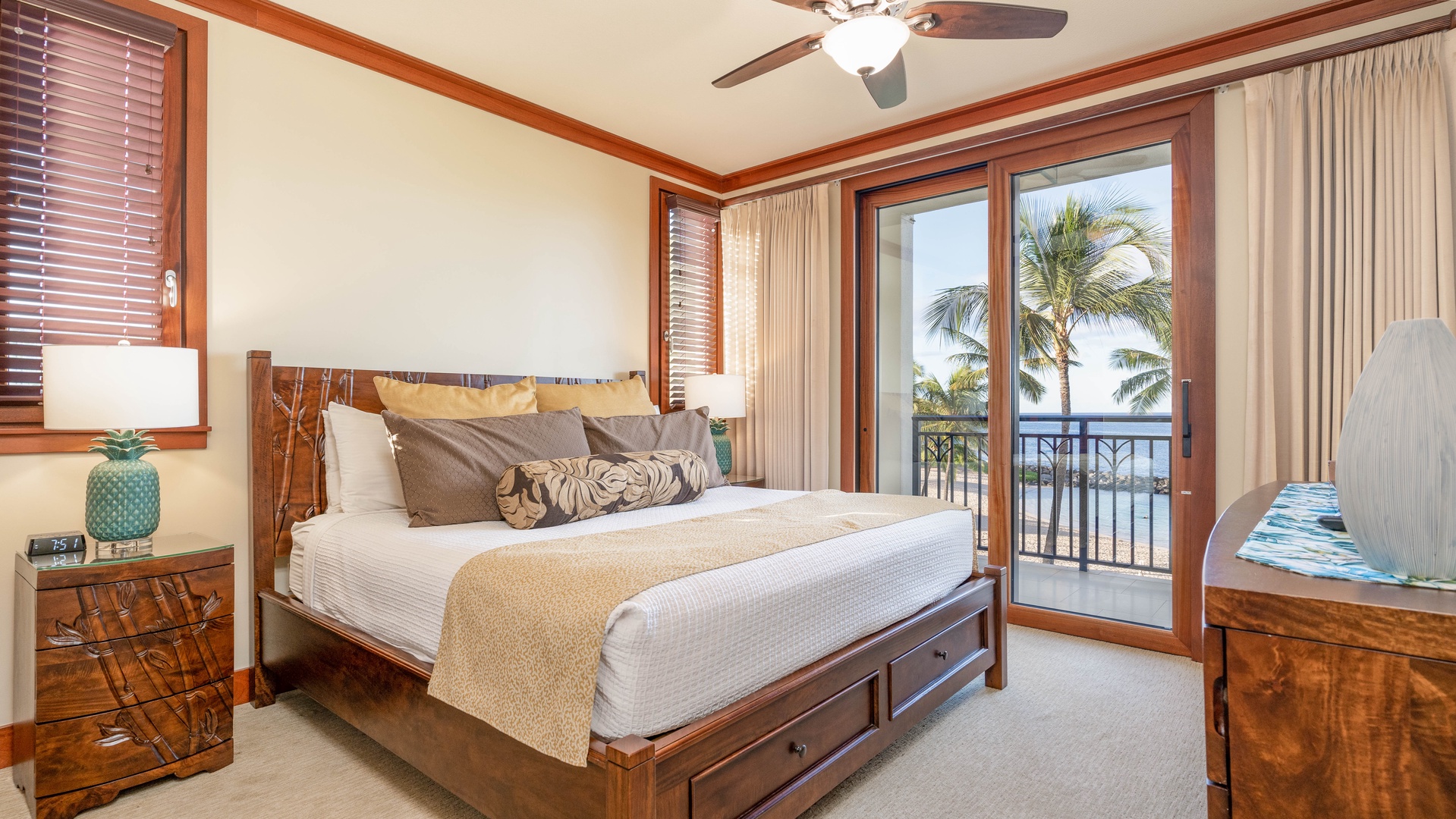 Kapolei Vacation Rentals, Ko Olina Beach Villas B309 - The primary guest bedroom with access to the lanai.