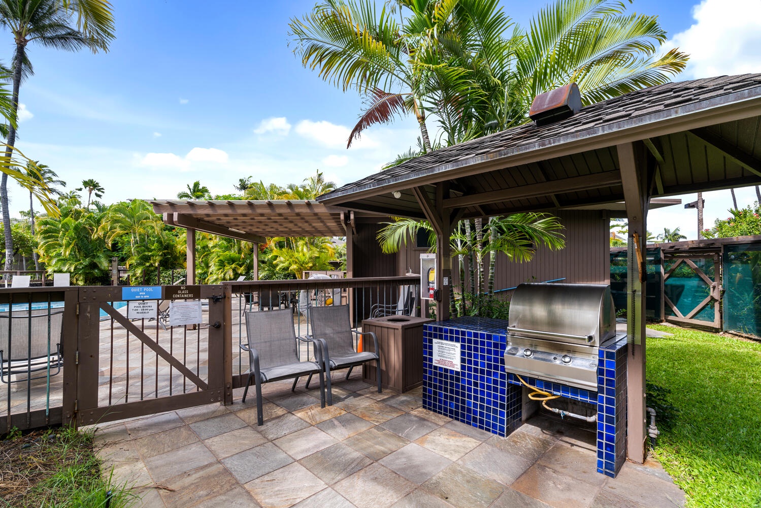 Kailua Kona Vacation Rentals, Kanaloa at Kona 3303 - The pool area has shared grilling area for guests.