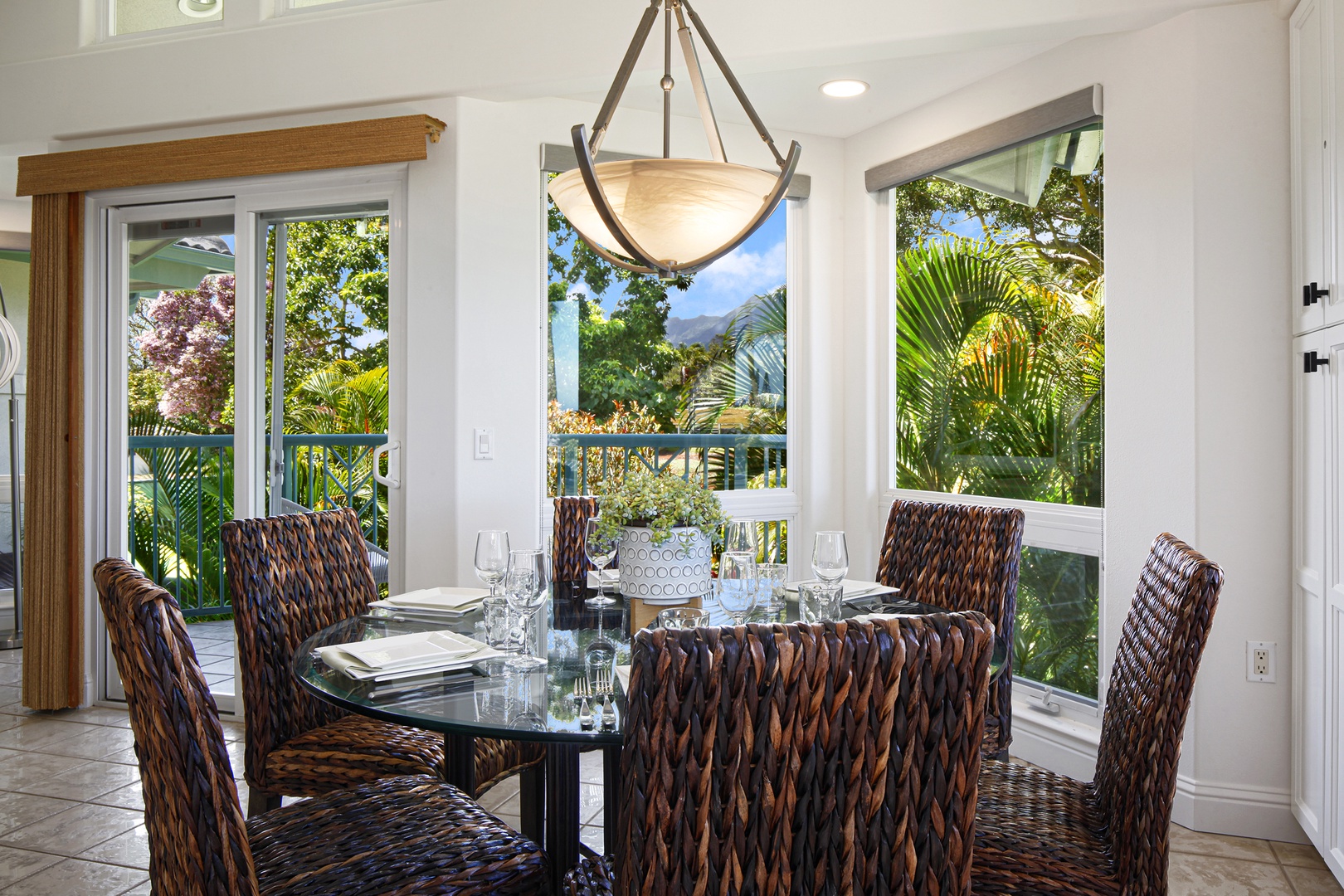 Princeville Vacation Rentals, Villas on the Prince #28 - The dining area comfortably seats 6 and has gorgeous views of the tropical landscape