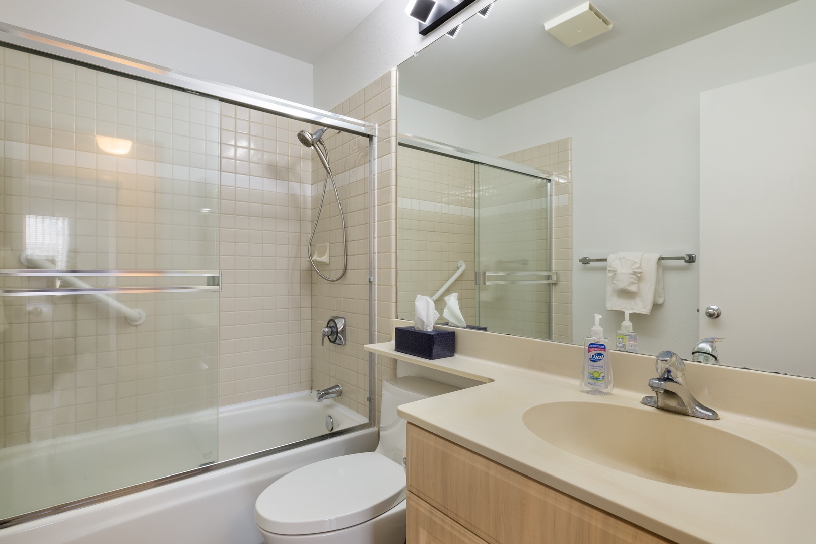 Kapolei Vacation Rentals, Fairways at Ko Olina 7A - Step into your pristine bathroom featuring a spacious glass-enclosed shower and modern vanity, designed for your comfort and convenience.