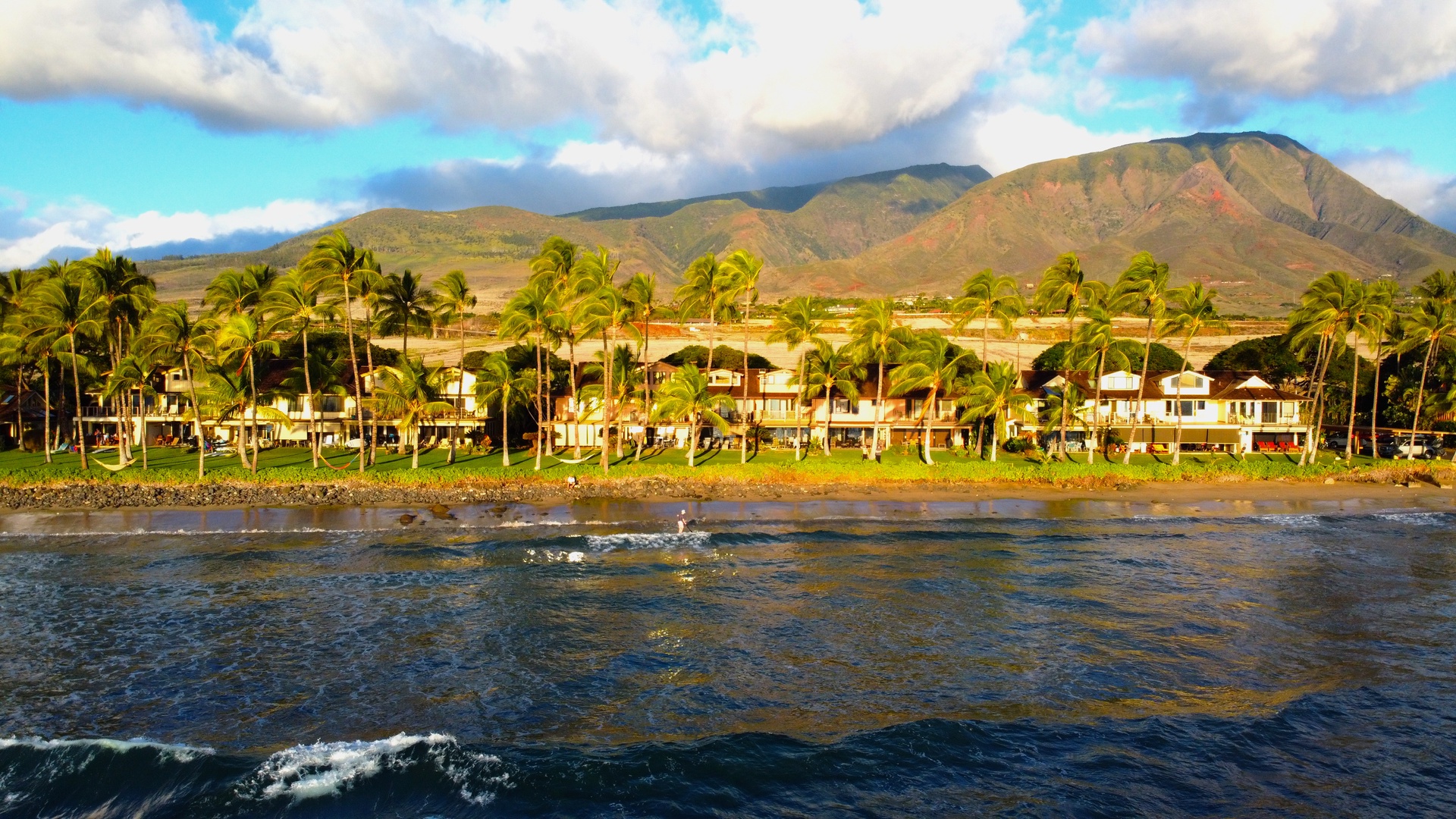 Lahaina Vacation Rentals, Puamana 240-3 - Experience Maui's coastal charm with stunning mountain views and serene waterfront vibes.