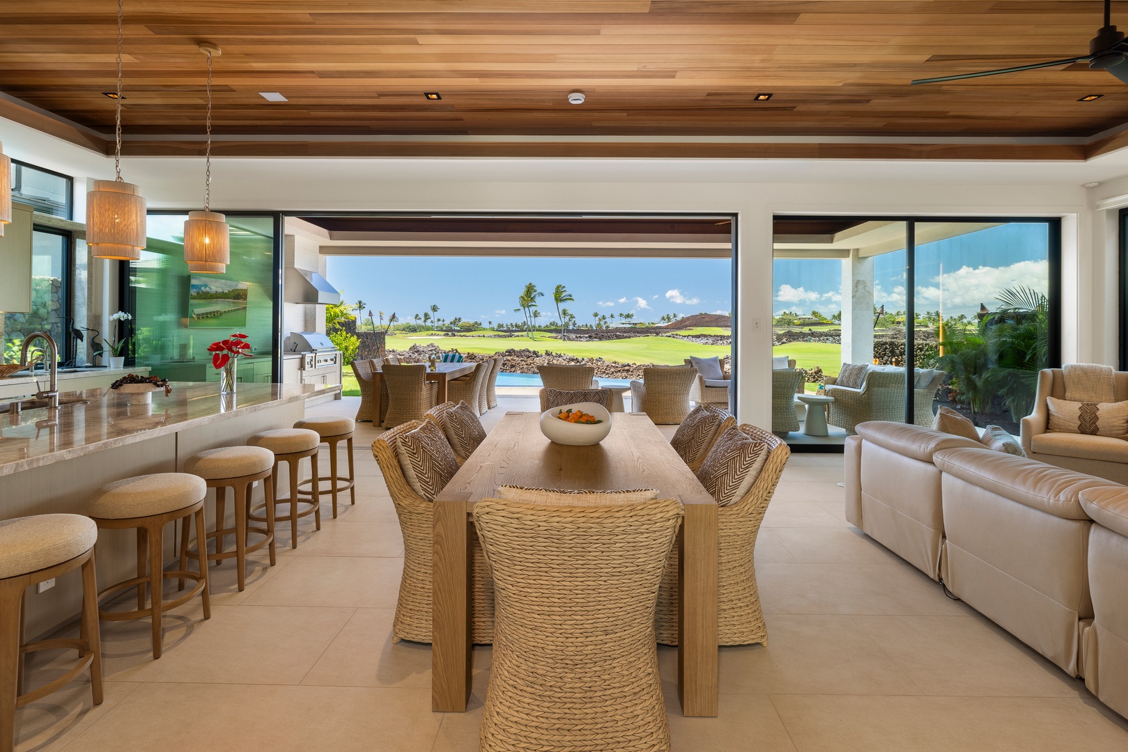 Kamuela Vacation Rentals, 6BD Mauna Lani Lux Golf Estate (5) at One Ocean - Space to gather, the sliding walls pulled wide to the deck.
