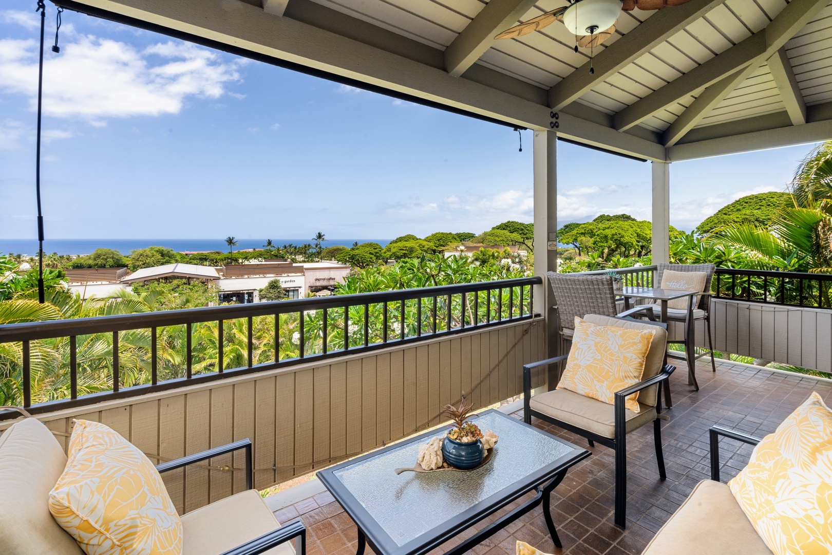 Kihei Vacation Rentals, Wailea Ekolu 204 - Coffee tastes better up here, ocean visible past the rooftops and the tree line below the lanai.
