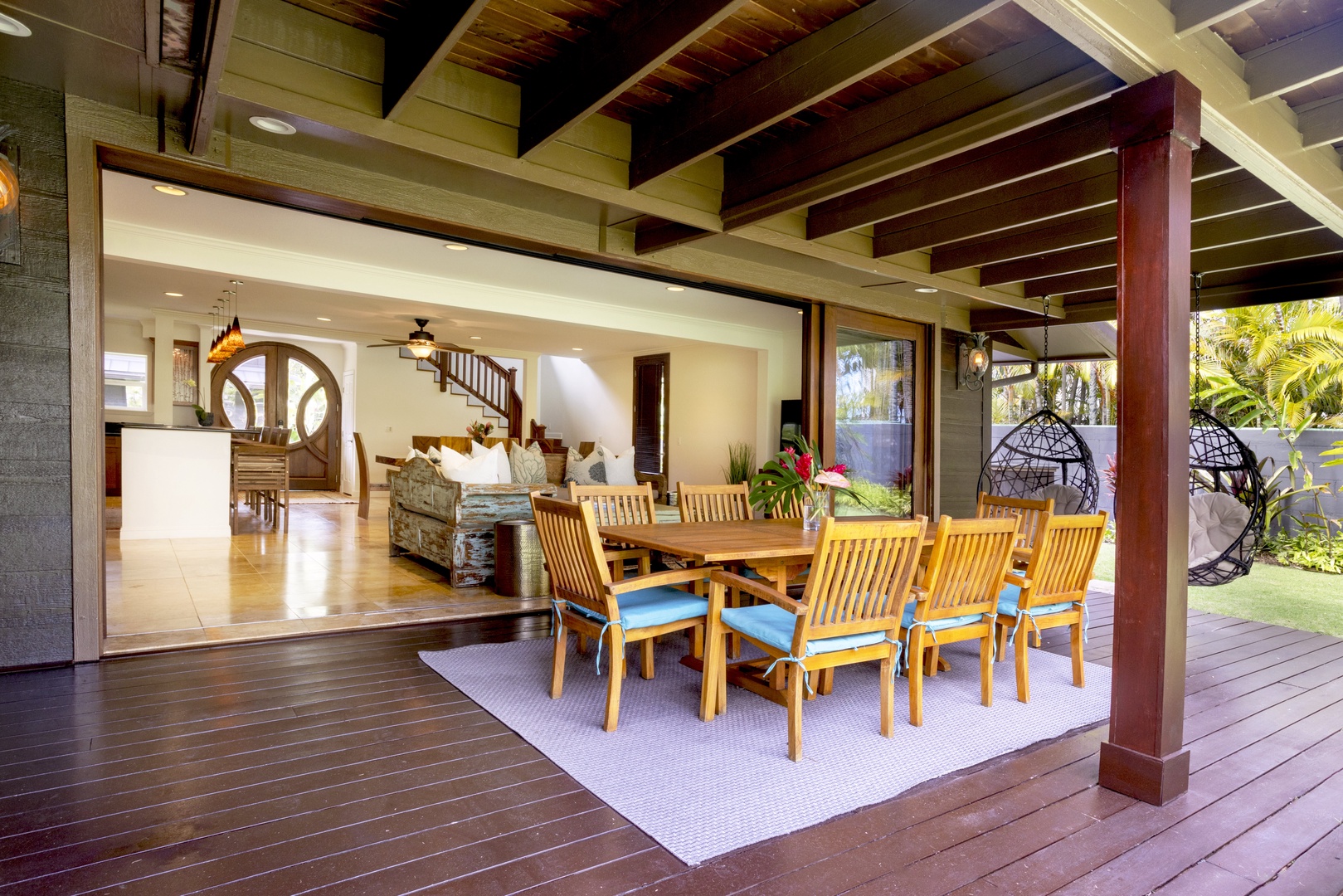 Kailua Vacation Rentals, Mokulua Seaside - The spacious covered lanai has dining for eight and easy access to the kitchen.