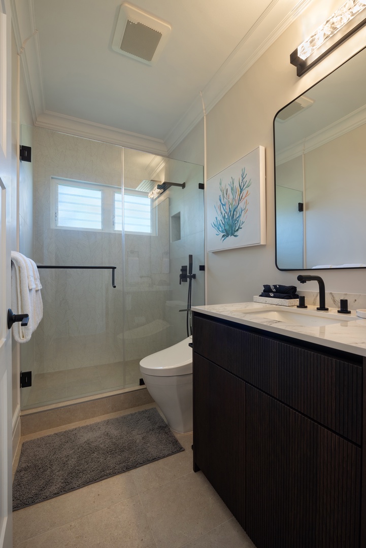 Princeville Vacation Rentals, Hihimanu House - Bright bathroom with a walk-in shower and contemporary design.