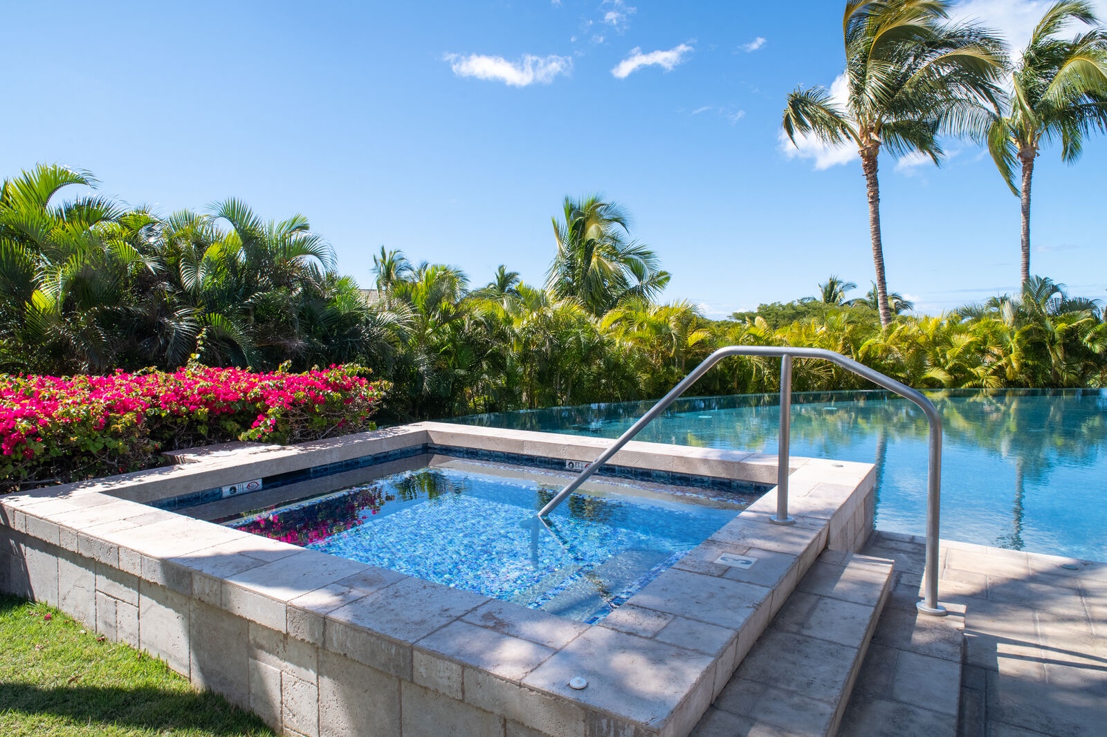 Kamuela Vacation Rentals, 3BD Wai'ula'ula Villa (312) at Mauna Kea Resort - Unwind by the shared pool surrounded by tropical greenery — a perfect spot for an afternoon swim.