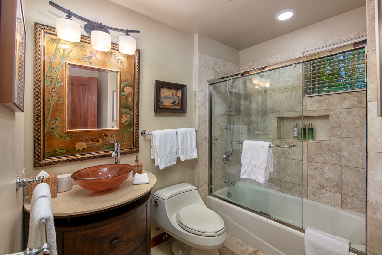 Kailua Kona Vacation Rentals, 2BD Hillside Villa (4102) at Hualalai Resort - The second bathroom features modern fixtures and a shower/tub combo.