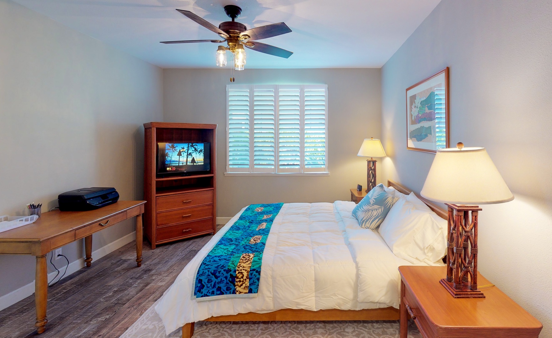 Kapolei Vacation Rentals, Ko Olina Kai 1051A - The primary guest bedroom features a TV and scenery.