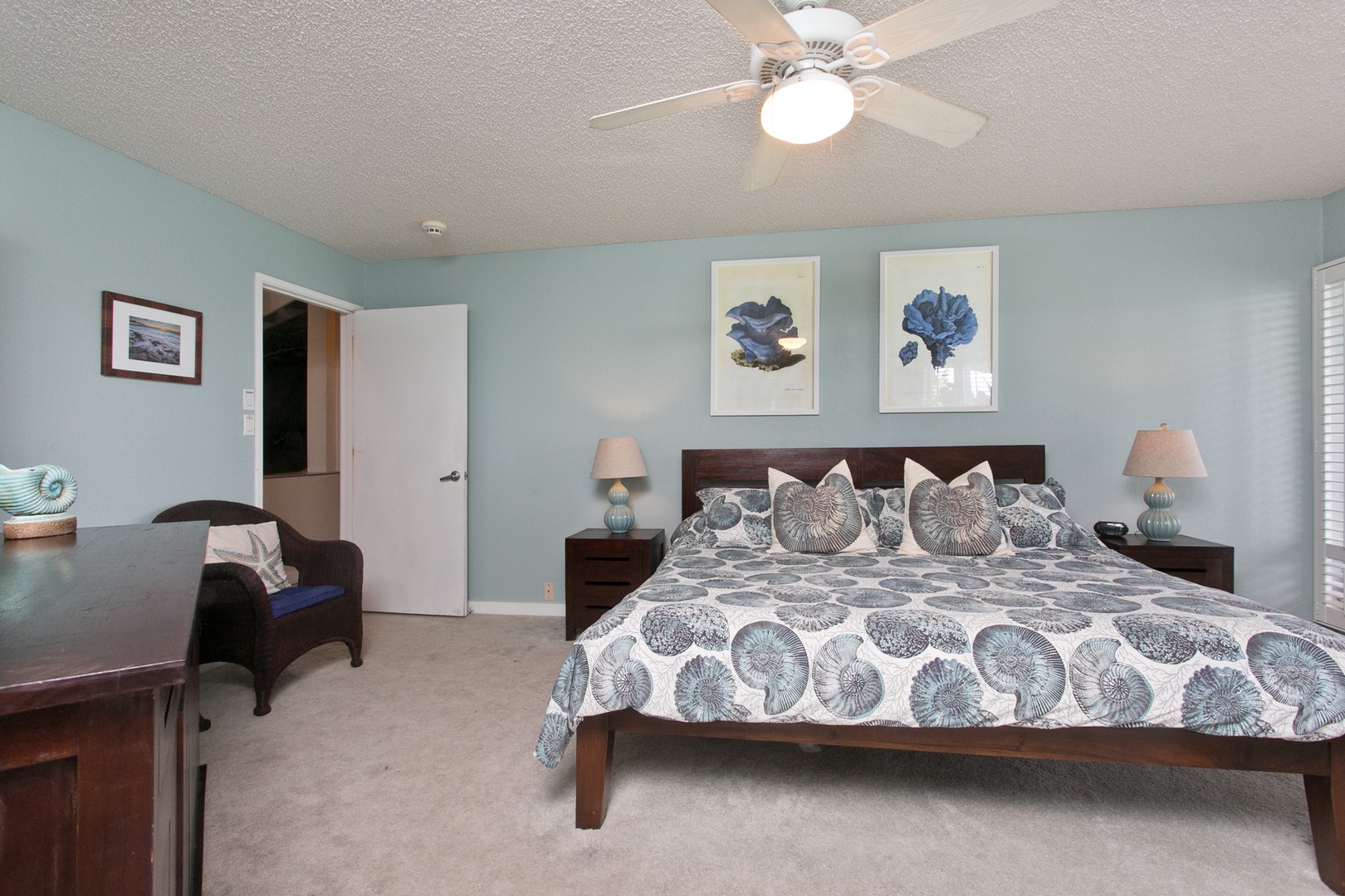 Kailua Vacation Rentals, Lanikai Village* - Hale Kolea: Guest bedroom with a plush king bed, TV and private lanai.