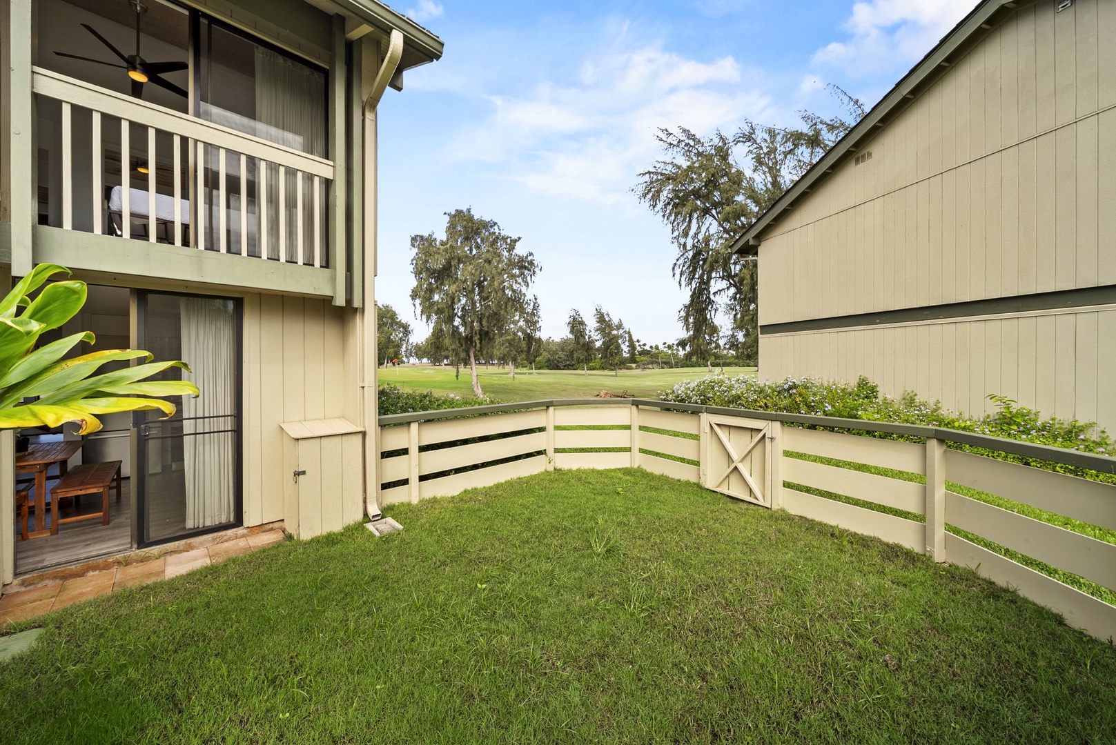 Kahuku Vacation Rentals, Kuilima Estates West #85 - Private, fenced in yard just outside the kitchen doors.
