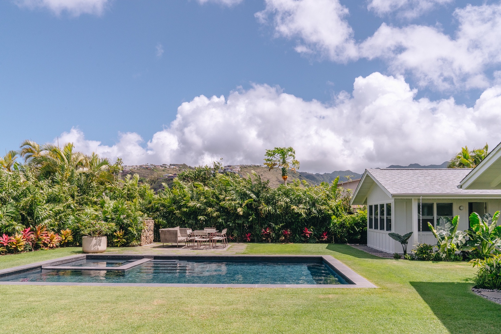 Honolulu Vacation Rentals, Surfside Bungalow** - The private pool and expansive lawn provide plenty of space to relax and unwind.