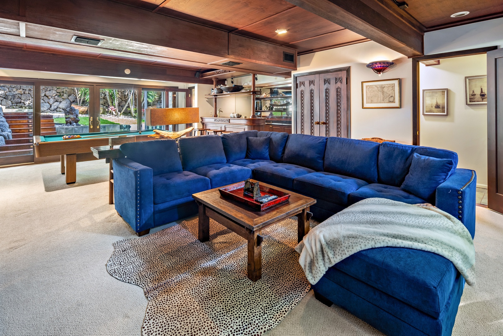 Honolulu Vacation Rentals, Kaiko'o Villa** - The ground floor of Kaiko’o Villa features the game, bar, and theater room of your dreams