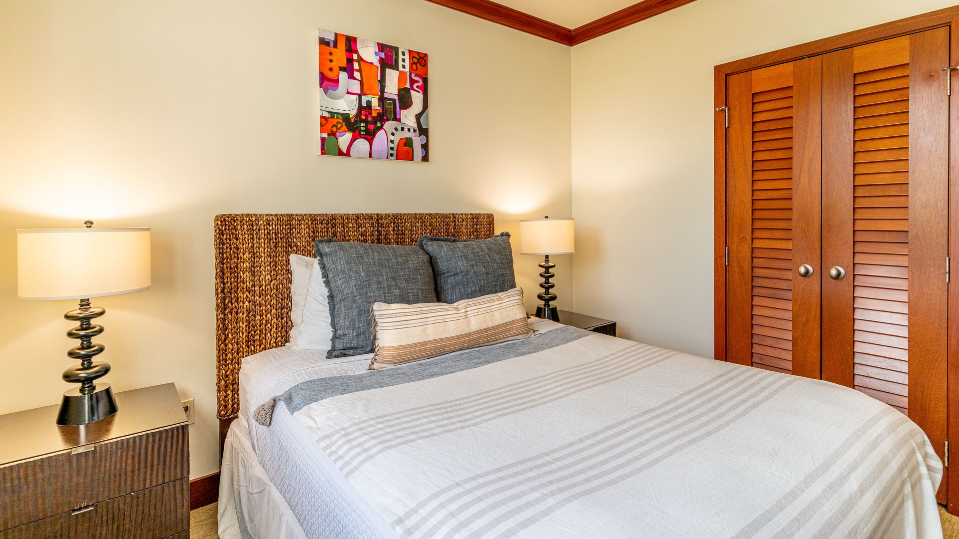 Kapolei Vacation Rentals, Ko Olina Beach Villas B403 - The second guest bedroom with a queen bed and TV.