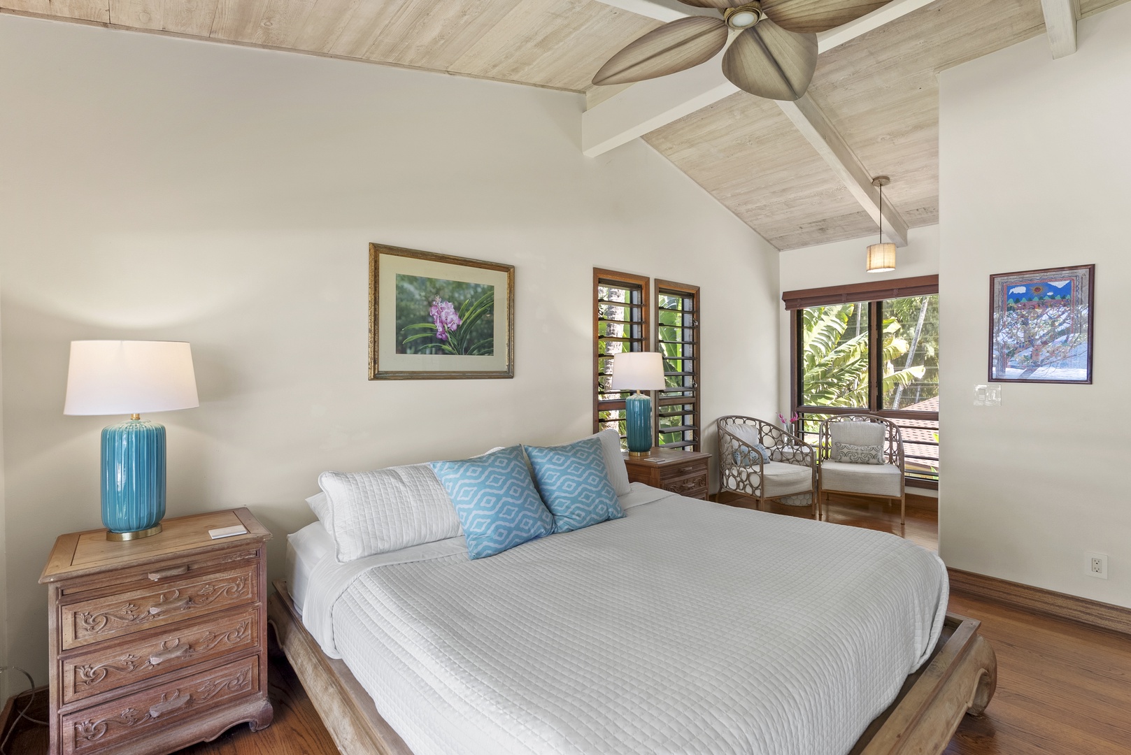 Haleiwa Vacation Rentals, Maluhia Beach House - Relax in this serene bedroom with a king-size bed, vaulted ceilings, and tropical views.