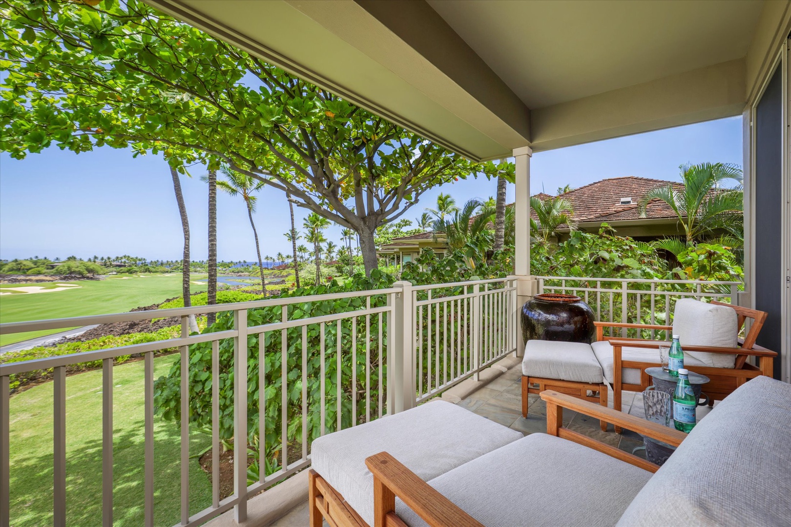 Kailua Kona Vacation Rentals, Wai'ulu Villa 115D - Covered lanai with plush seating and panoramic golf course views—your private slice of paradise.