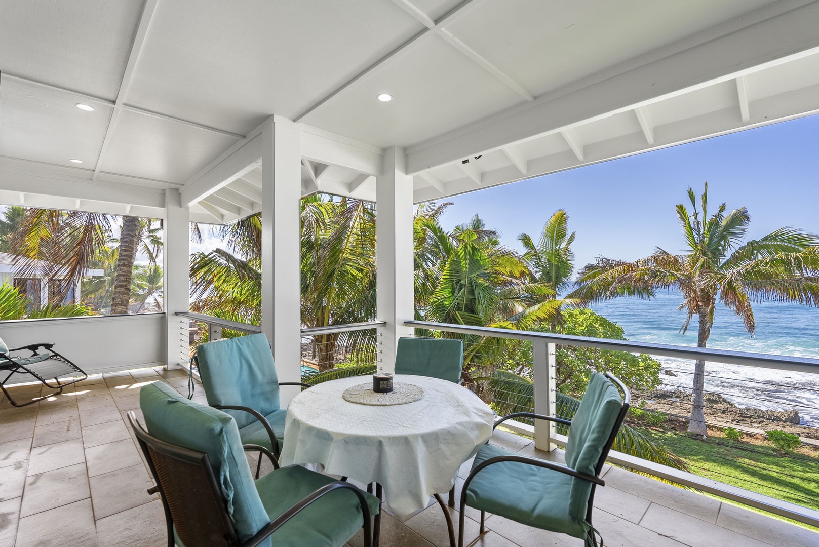 Waianae Vacation Rentals, Oceanfront Luxury Dream Estate - Upstair lanai with alfresco dining and peaceful garden surroundings.
