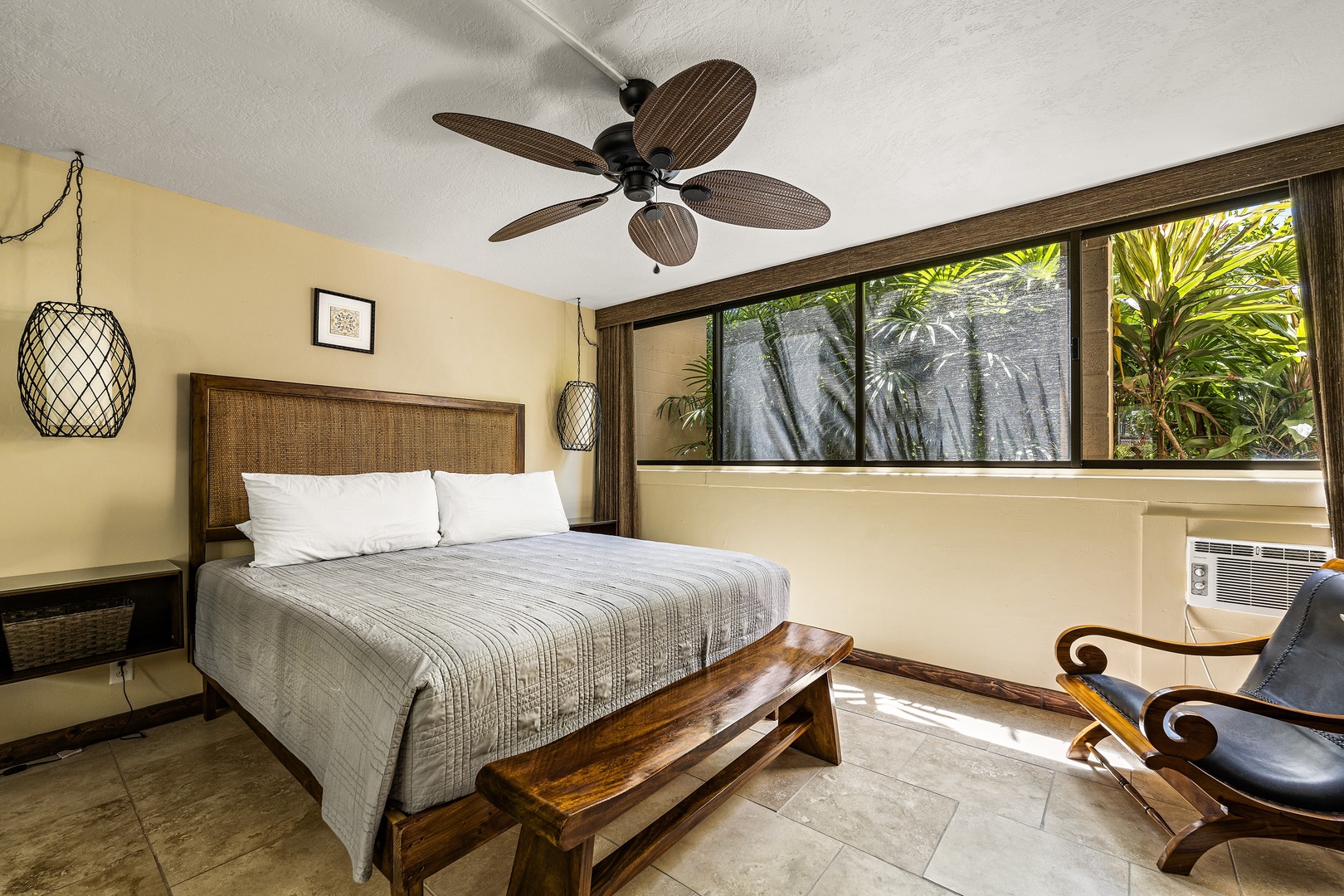 Kailua Kona Vacation Rentals, Kona Makai 2103 - Luxurious King sized bed in the bedroom with green scape out the window