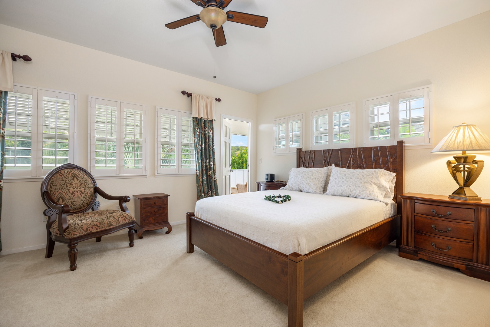 Kapolei Vacation Rentals, Coconut Plantation 1150-2 - Rest peacefully in your elegant bedroom, where rich wood furnishings and soft natural light create a serene retreat.