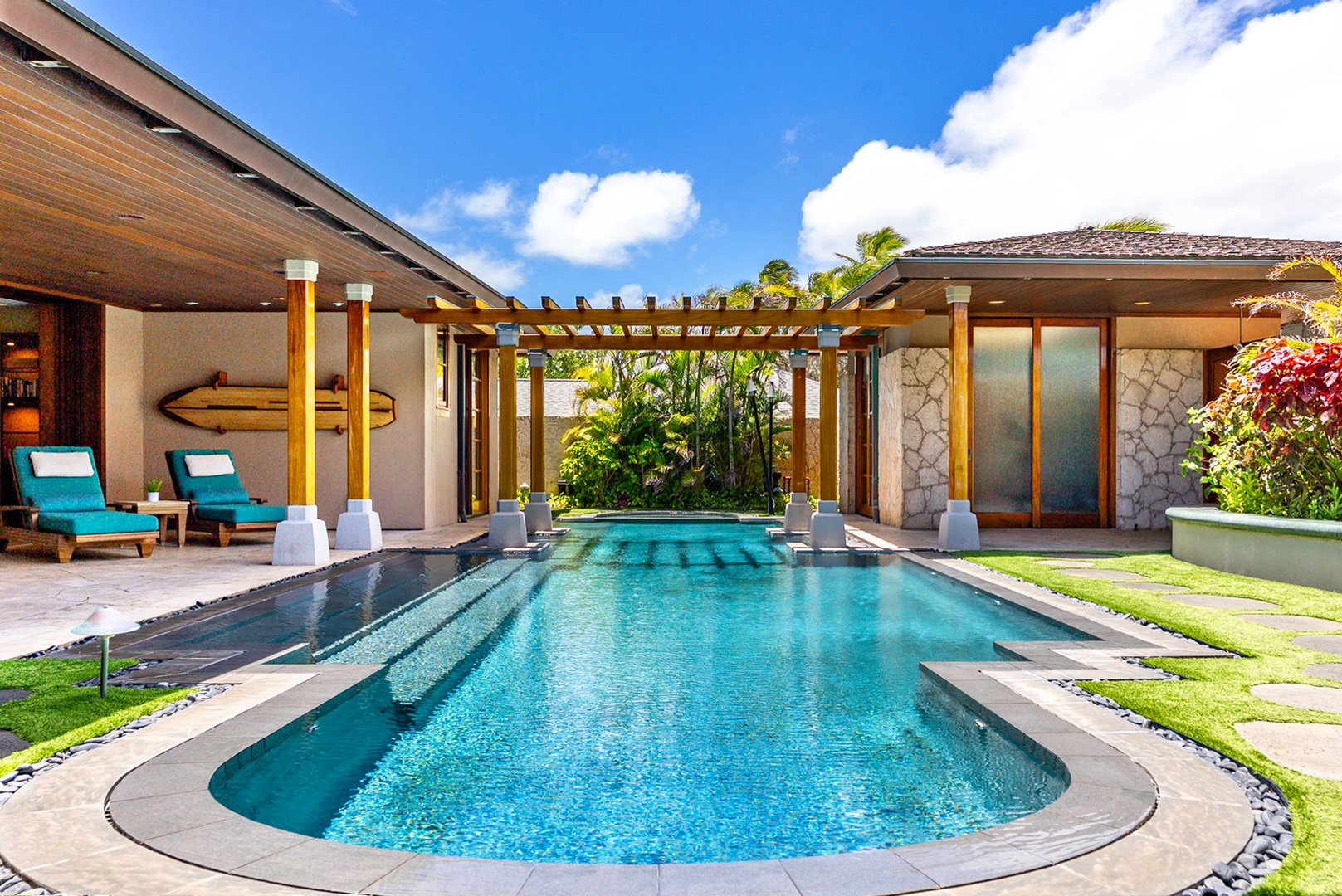 Kailua Vacation Rentals, Kailua Sands - Private pool courtyard framed by tropical gardens.