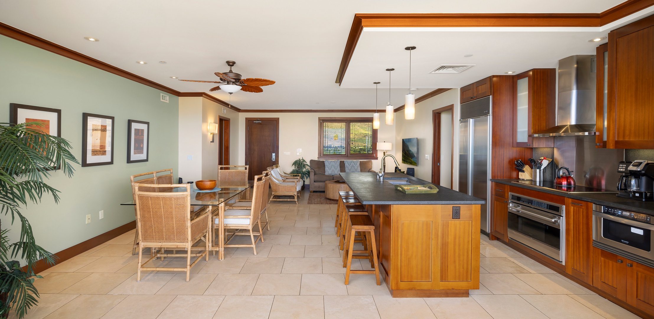 Kapolei Vacation Rentals, Ko Olina Beach Villas B901 - Your open-concept suite seamlessly blends gourmet kitchen, elegant dining space, and relaxing living area for effortless entertaining.