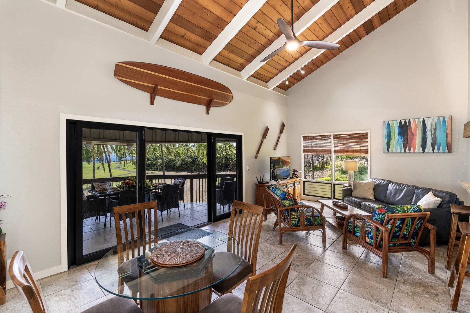 Kailua Kona Vacation Rentals, Kanaloa at Kona 1606 - Vaulted ceilings rise over the dining table, sliding doors opening to the light.