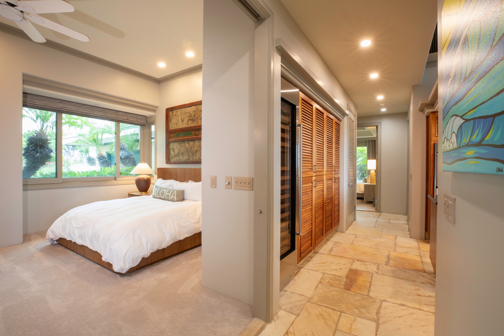 Kamuela Vacation Rentals, Canoe House at Champion Ridge - Cozy guest bedroom with queen-sized bed, simple décor and natural light, offering a peaceful space for rest.