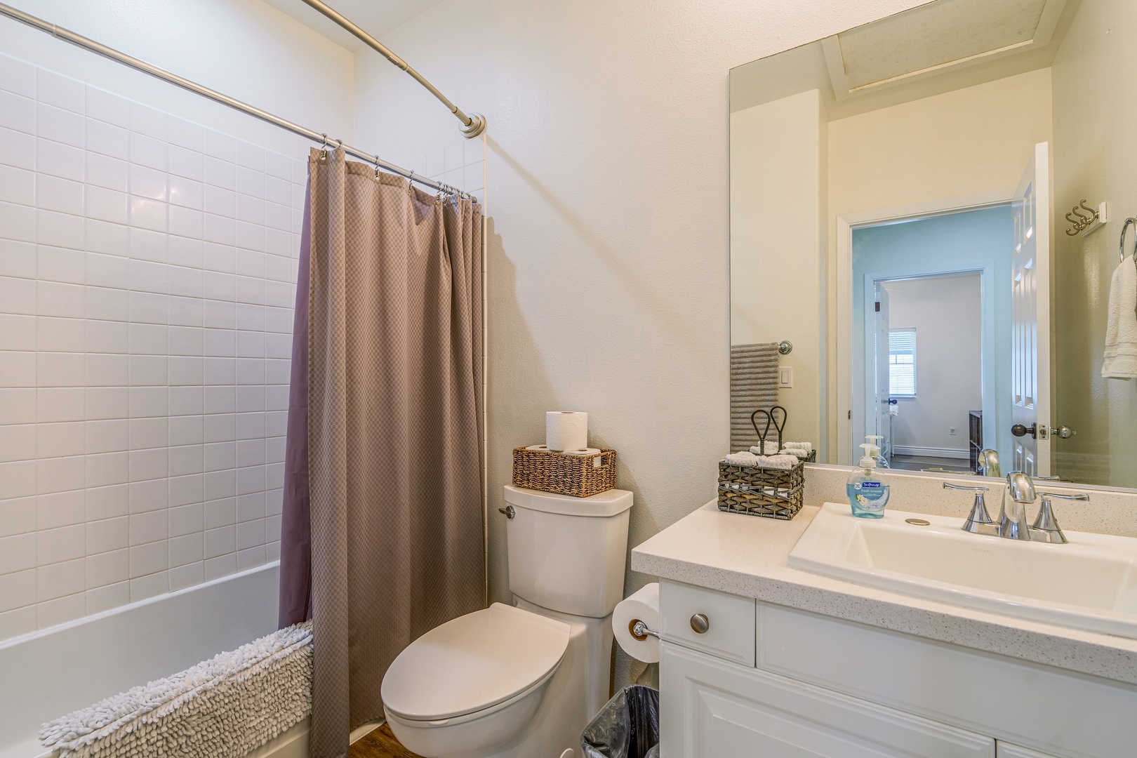 Kapolei Vacation Rentals, Coconut Plantation 1078-1 - The third guest bathroom features a bright vanity and shower.