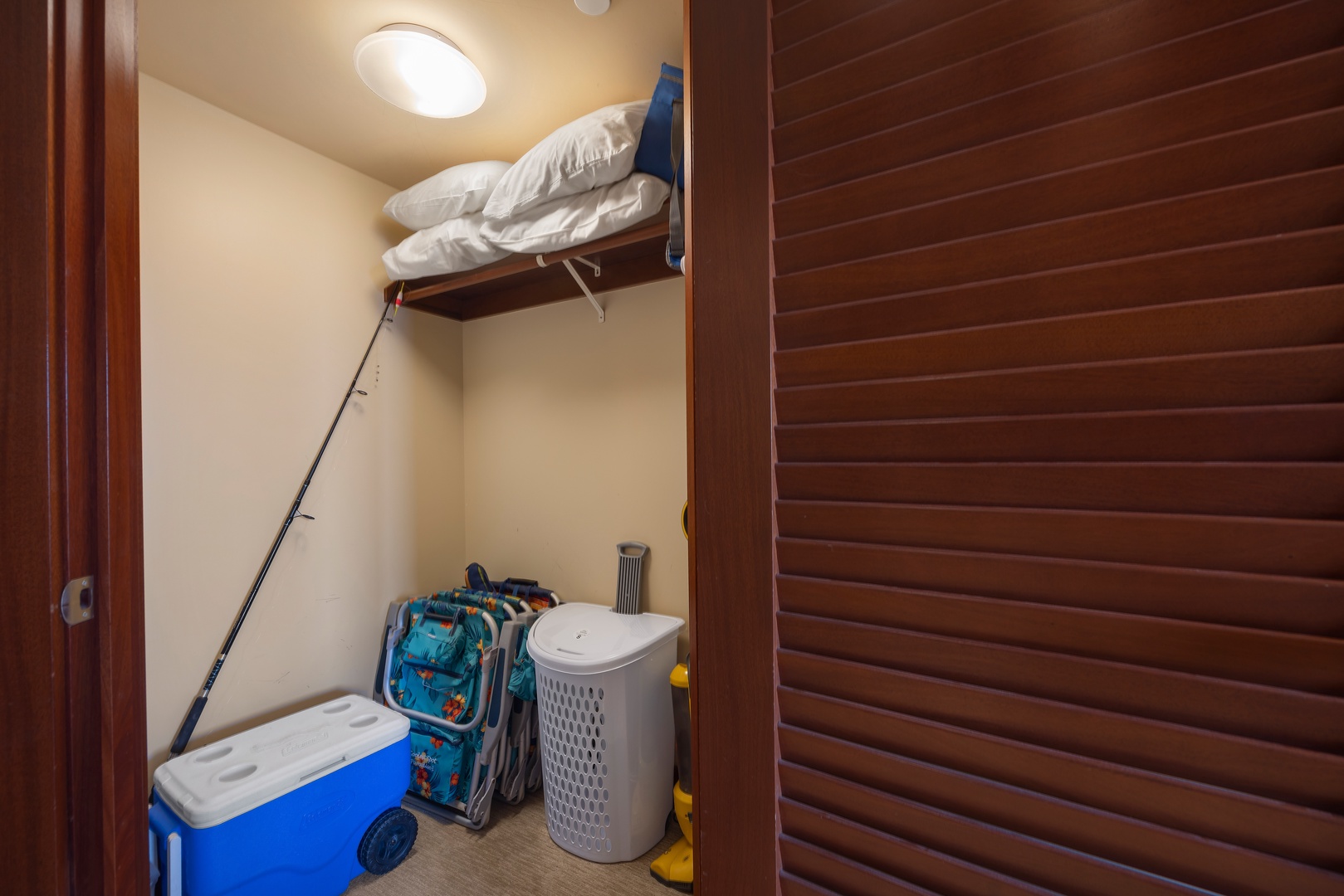Kapolei Vacation Rentals, Ko Olina Beach Villas O1111 - Your private storage closet keeps beach gear, coolers, and linens organized and easily accessible during your stay.