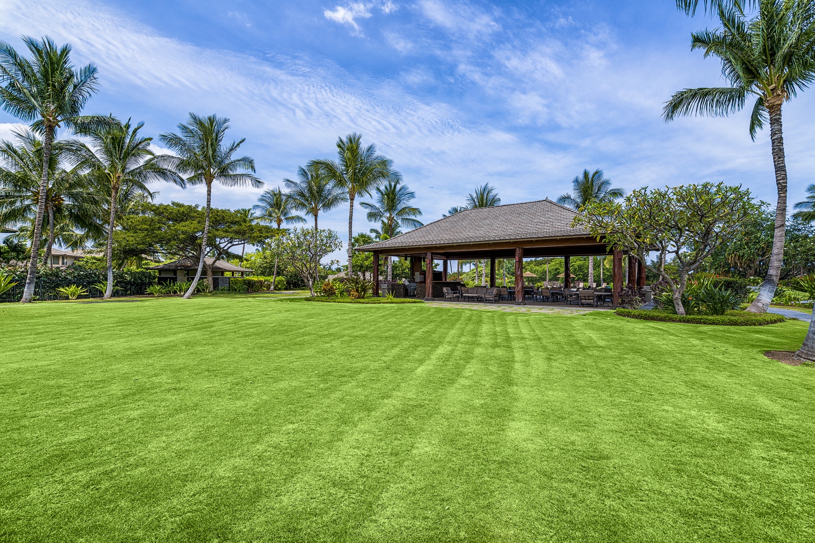 Kamuela Vacation Rentals, Mauna Lani KaMilo #503 - A spacious green space near the community pavilion—perfect for family games, yoga stretches, or letting little ones run free.