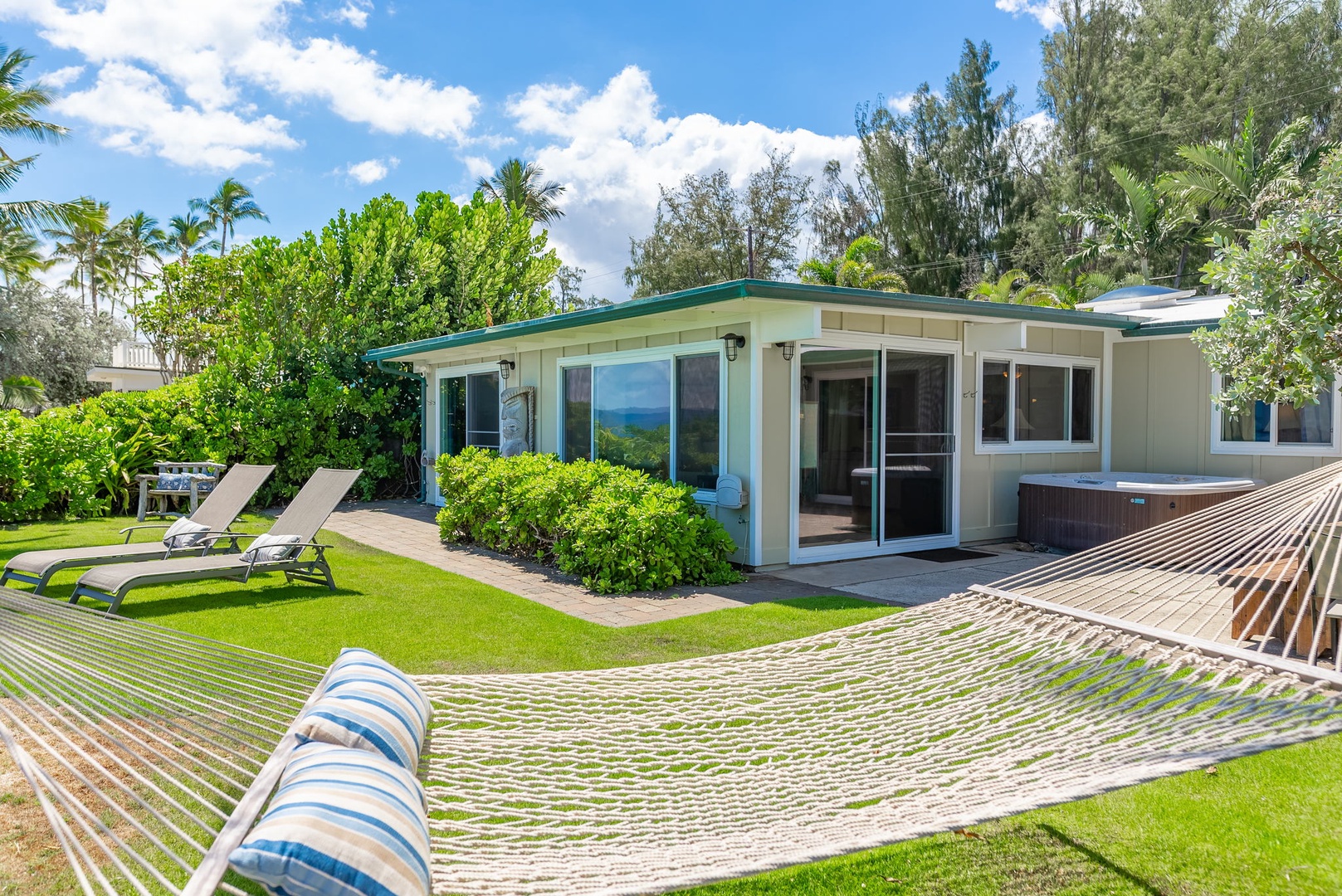 Waialua Vacation Rentals, Hale Oka Nunu - Enjoy soaking up the sun in a hammock