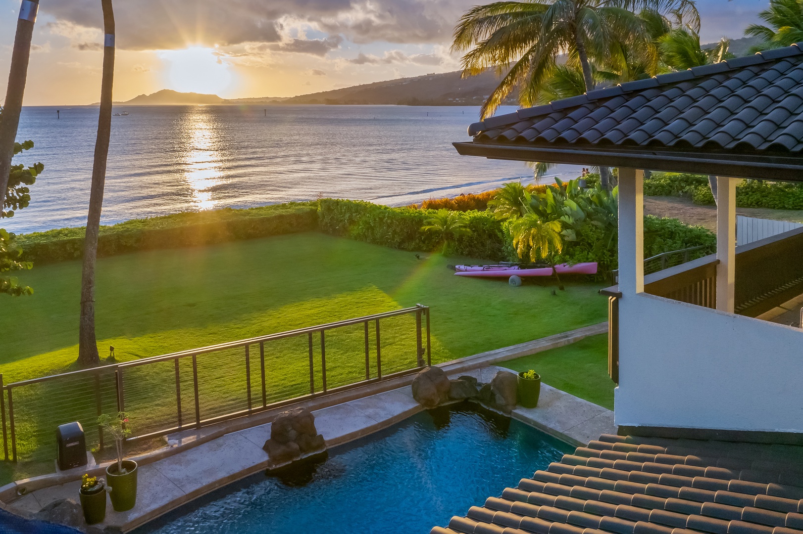 Honolulu Vacation Rentals, Nanea Kai Villa - Relax by the pool with a cool drink and sunset views.