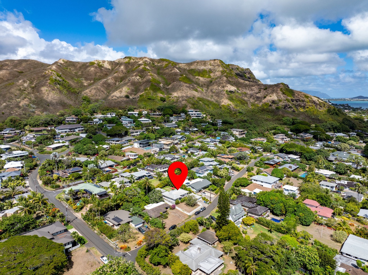 Kailua Vacation Rentals, Hale Alapi'i Lanikai Getaway - This aerial image fetaures a tranquil community at the foot of dramatic mountain ridges.