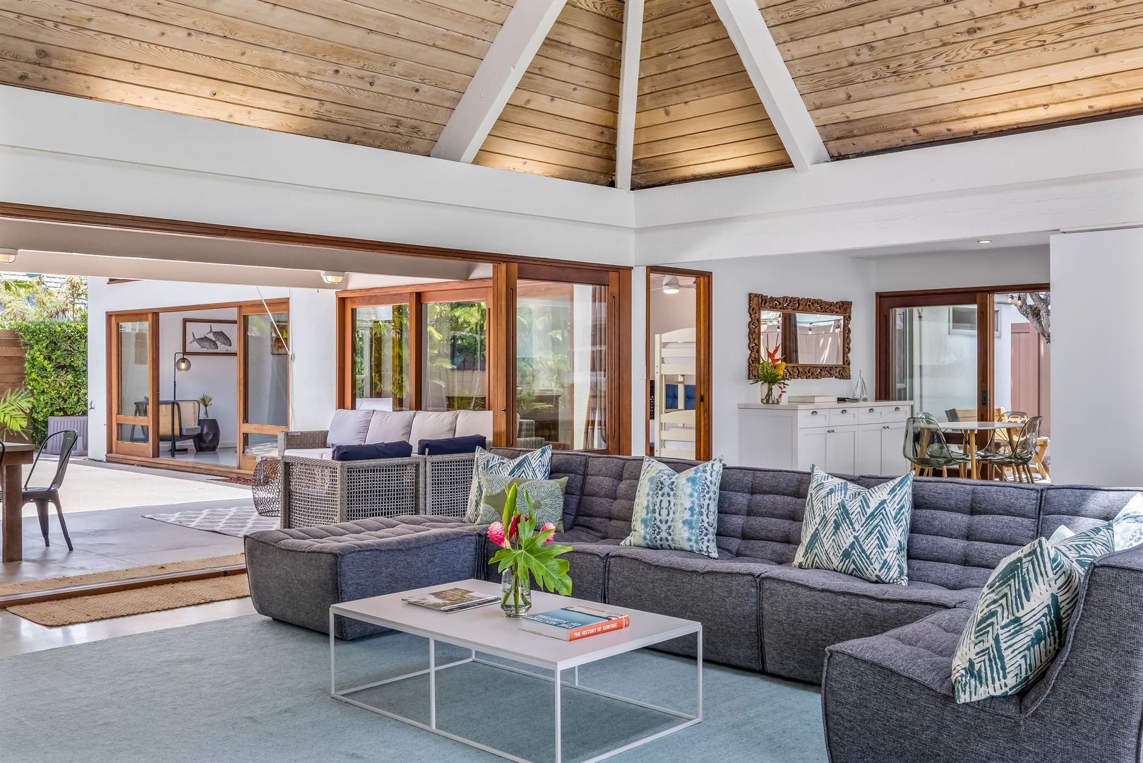 Kailua Vacation Rentals, Lokomaika'i Kailua - Experience the grandeur of a cathedral ceiling in the living area, complemented by a section of glass roofing, allowing an abundance of natural light to cascade in, illuminating the space beautifully.