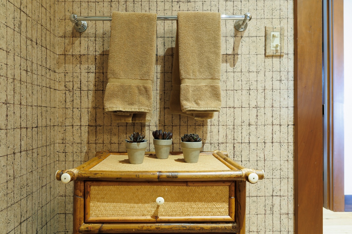 Kailua Kona Vacation Rentals, Fairways Villa 120A - Your private bathroom features thoughtful touches with fresh towels and charming succulent accents for a peaceful retreat.