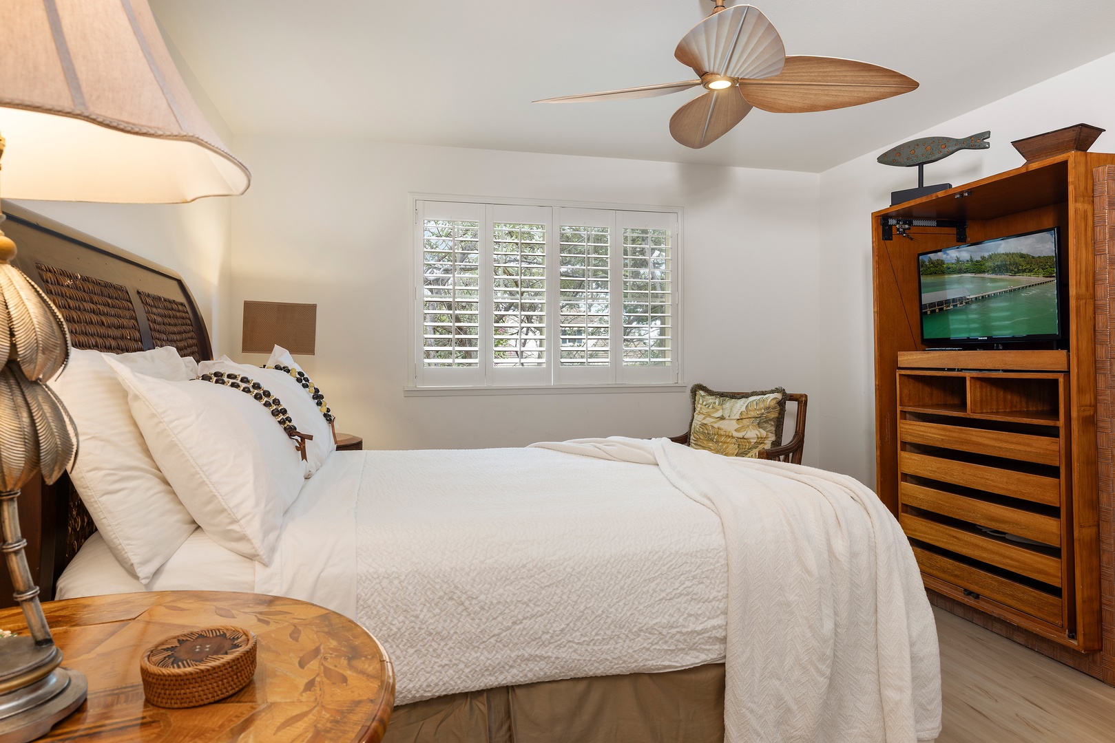 Kapolei Vacation Rentals, Ko Olina Kai 1105E - Sink into crisp linens and coastal charm in your serene bedroom retreat, where tropical breezes and plantation shutters create your perfect island escape.