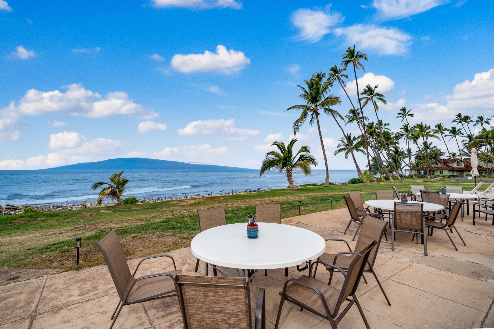 Lahaina Vacation Rentals, Puamana 254-2 - The open-air hale at Puamana Resort provides a perfect beachfront setting for al fresco dining.