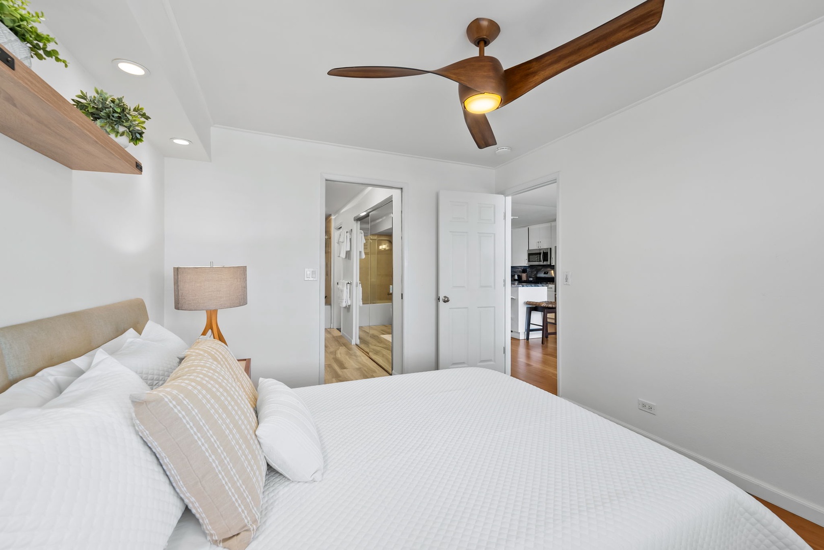 Honolulu Vacation Rentals, Colony Surf Retreat - Ample floor space, a ceiling fan, and calming textures make this bedroom a private retreat within your beachfront escape.