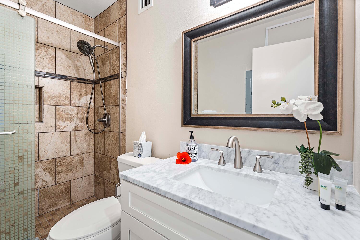 Kailua Kona Vacation Rentals, Keauhou Kona Surf & Racquet 1104 - Chic ensuite bathroom featuring a streamlined single sink – a perfect blend of style and convenience for your personal retreat.