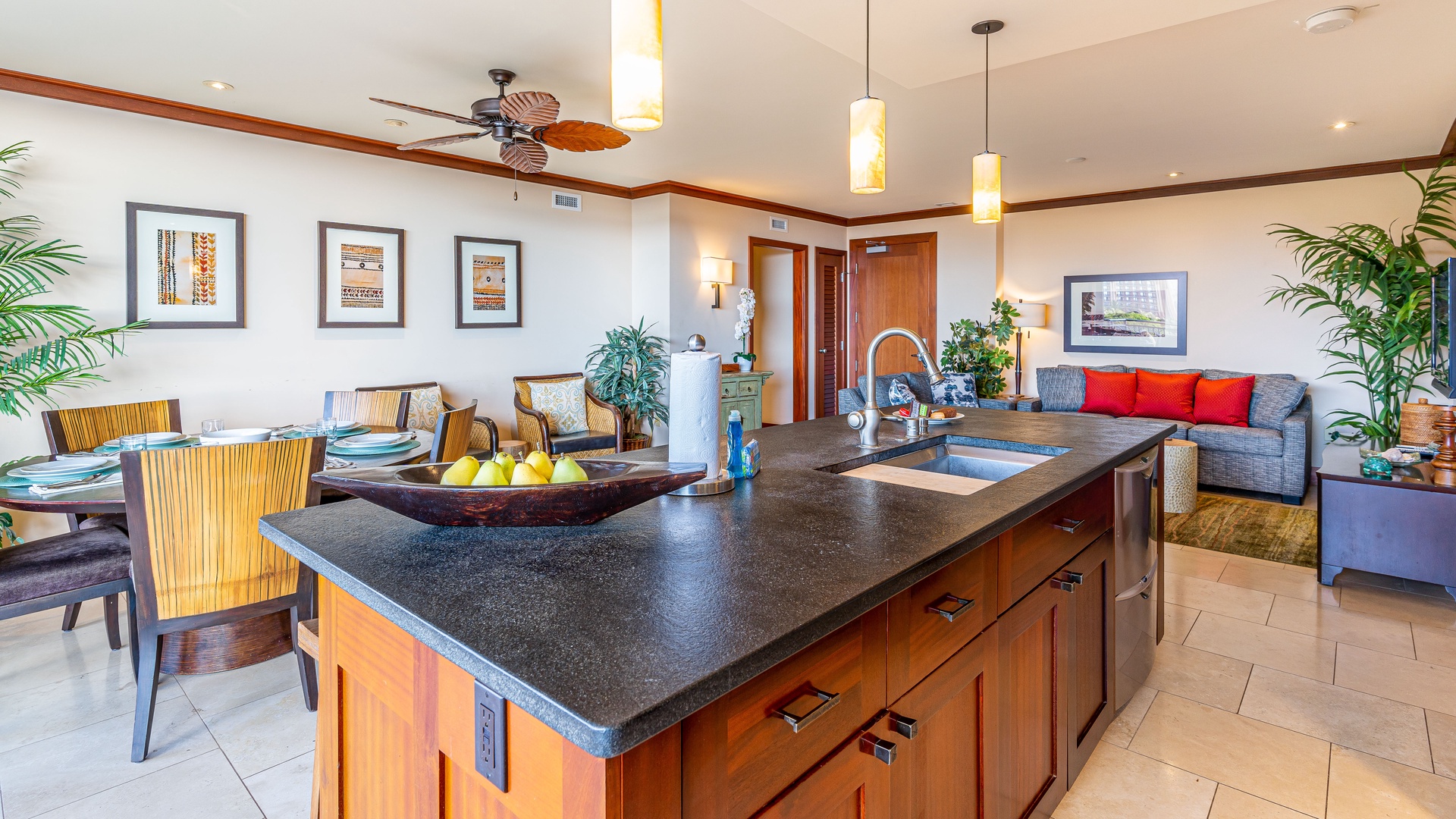Kapolei Vacation Rentals, Ko Olina Beach Villas B706 - The TV is fantastic for movie nights and the kitchen island expansive for your culinary adventures.