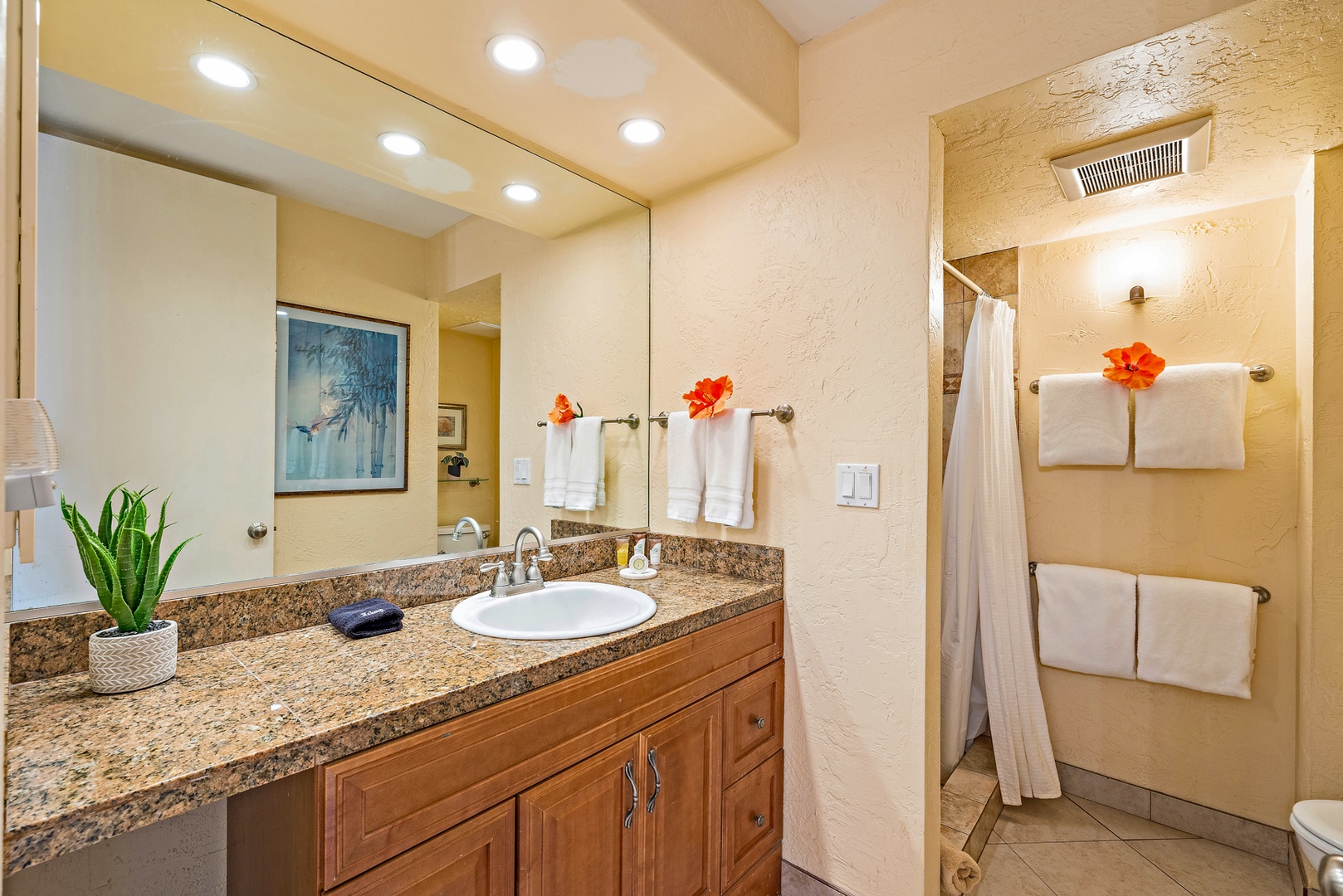 Lahaina Vacation Rentals, Papakea G-306 - The bathroom offers a spacious vanity with granite countertops and a walk-in shower, providing a refreshing space to start or end your day.