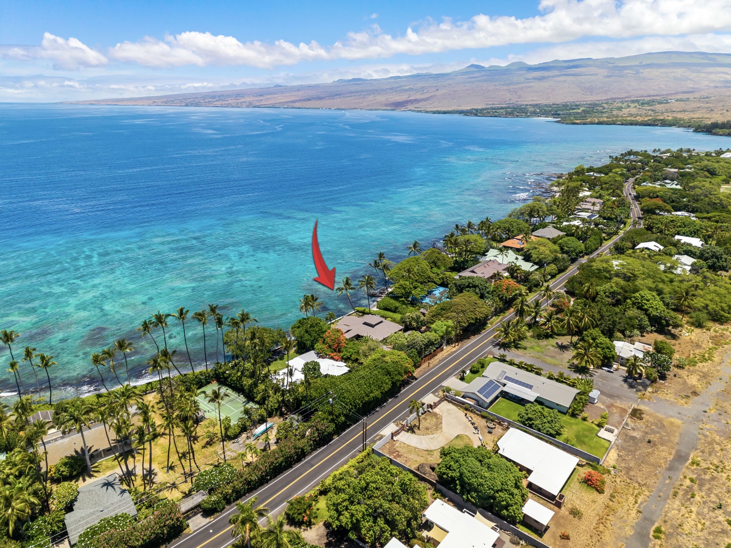 Kamuela Vacation Rentals, Island Time Retreat - A wider look at the Puako shoreline, the home tucked along the reef's edge.