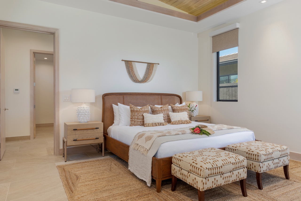 Waimea Vacation Rentals, 5BD Mauna Lani Lux Golf Estate (4) at One Ocean - Discover serene comfort in this elegantly appointed bedroom, featuring a plush king-sized bed and harmonious decor.