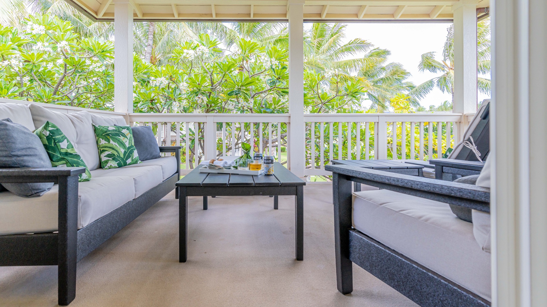 Kapolei Vacation Rentals, Coconut Plantation 1136-4 - The upstairs lanai nestled in the trees.