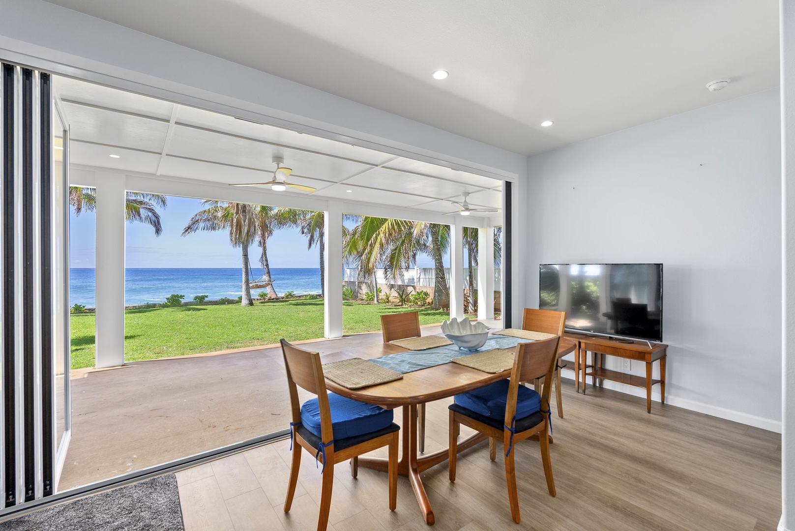 Waianae Vacation Rentals, Oceanfront Luxury Dream Estate - Ocean-view breakfast nook with full-height windows—perfect for sunrise coffee or evening wine.