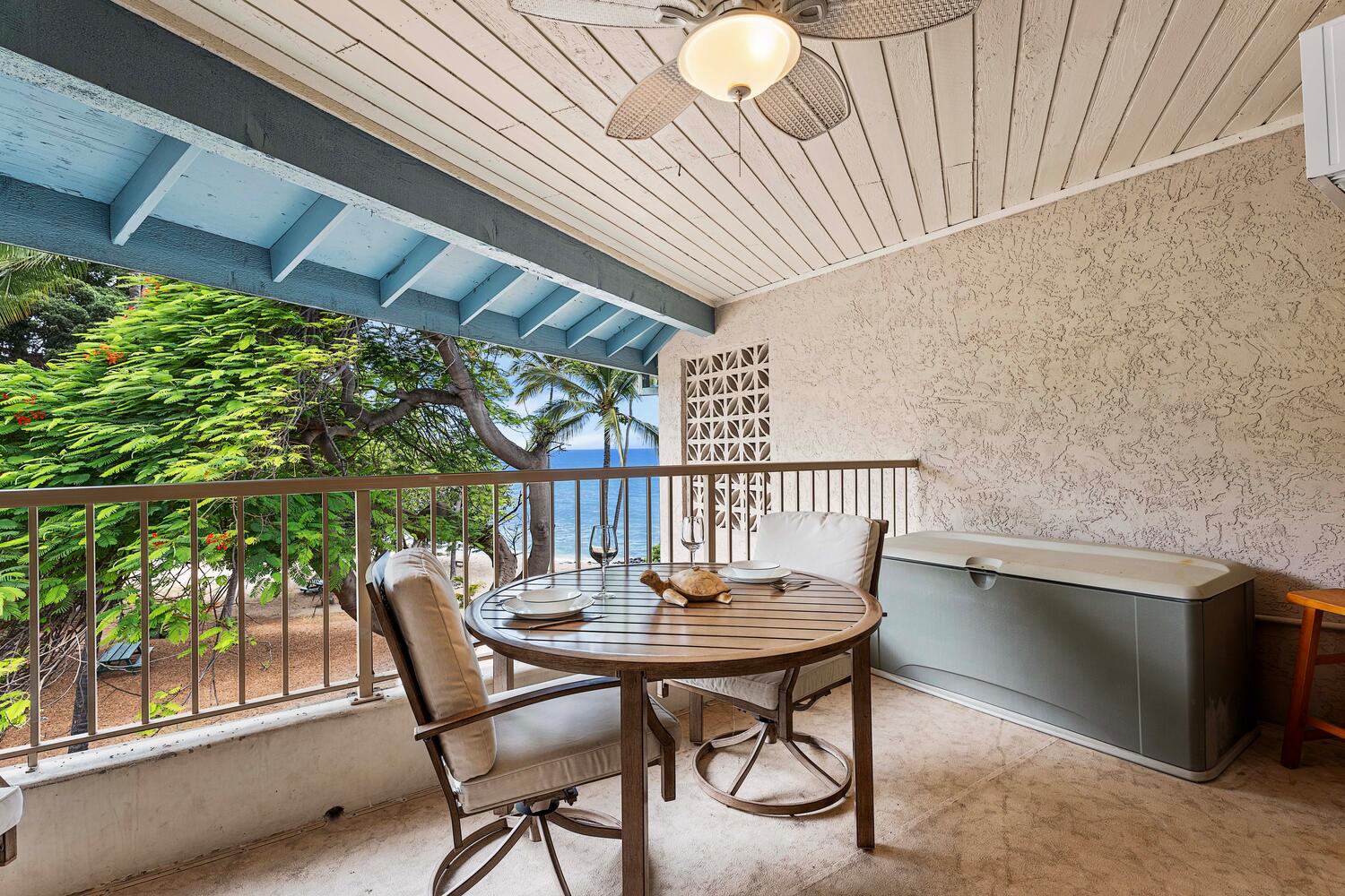 Kailua-Kona Vacation Rentals, Kona Reef B32 - Enjoy your morning coffee on the lanai with ocean views.