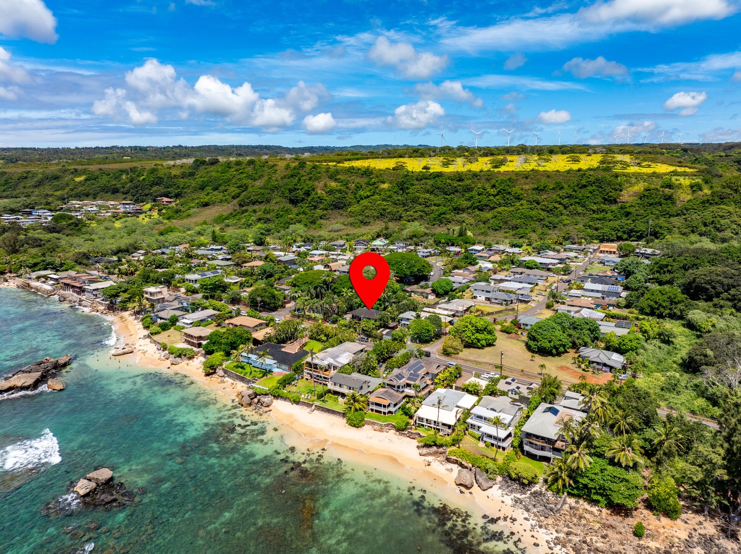 Haleiwa Vacation Rentals, Kealoha Tropical Beach Villa - Aerial shot of the home and the nearby beach.