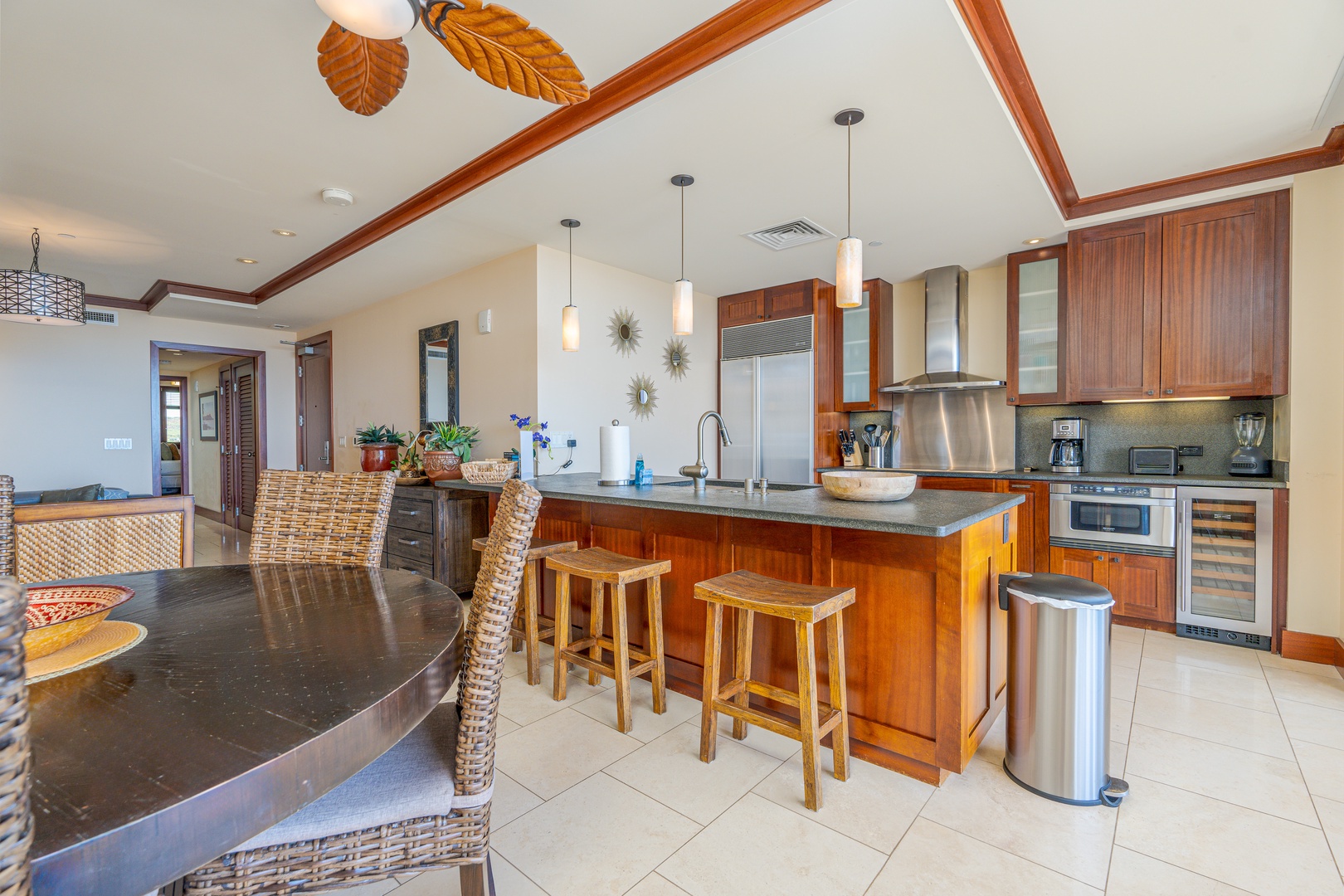 Kapolei Vacation Rentals, Ko Olina Beach Villas O904 - The open floor plan with seating at the breakfast bar.